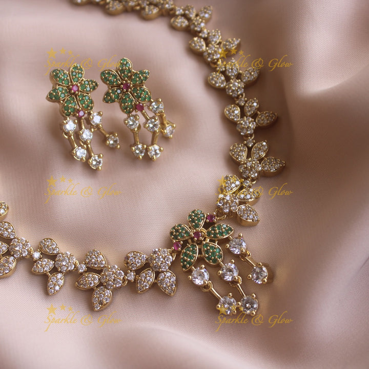 Stunning Floral and Leaflet design AD short necklace with emerald stones