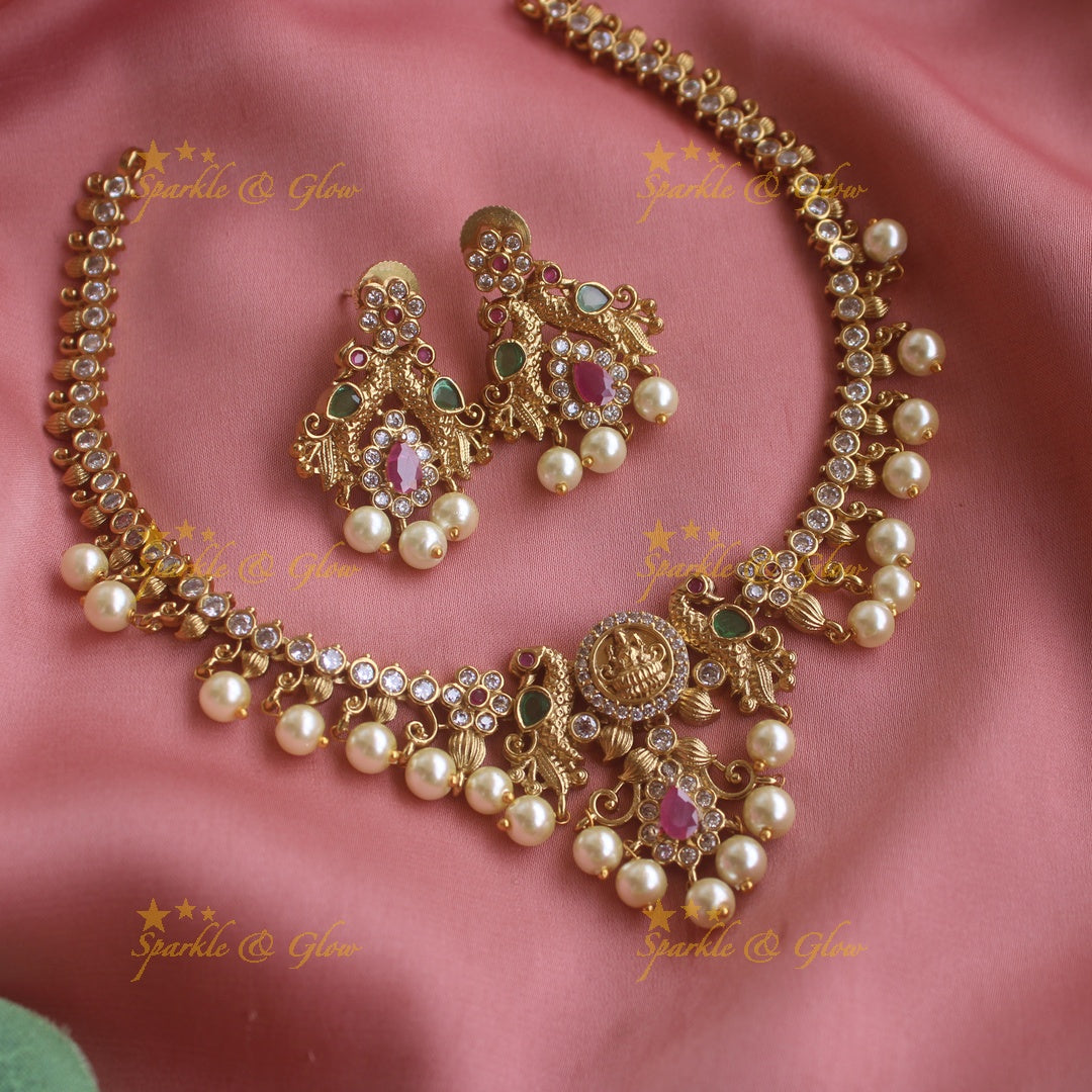 Beautiful Lakshmi peacock design short necklace with CZ stones and pearl drops