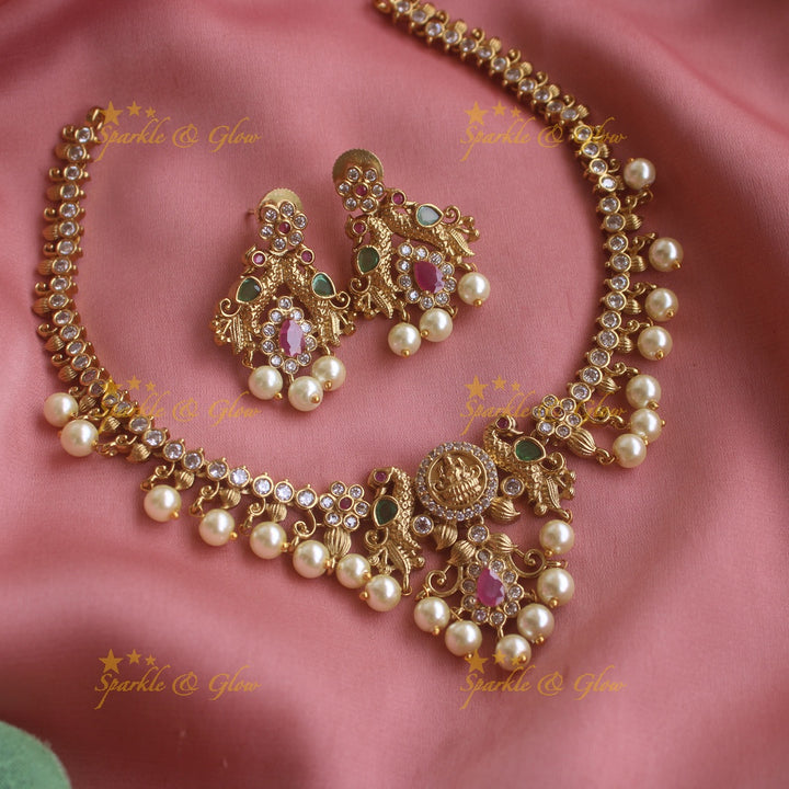Beautiful Lakshmi peacock design short necklace with CZ stones and pearl drops