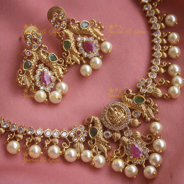 Beautiful Lakshmi peacock design short necklace with CZ stones and pearl drops