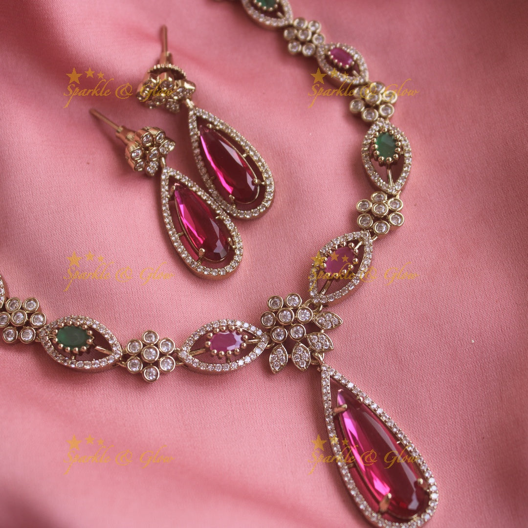 Statement Floral and oval stone drop AD short necklace with ruby and emeralds