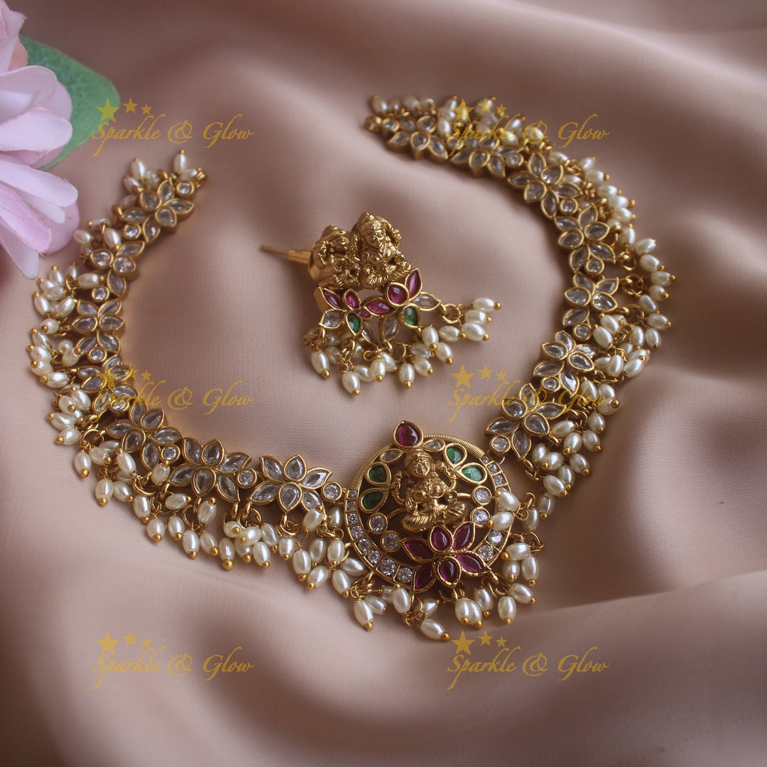 Statement Lakshmi lotus design short necklace with ruby emerald CZ stones and rice pearls