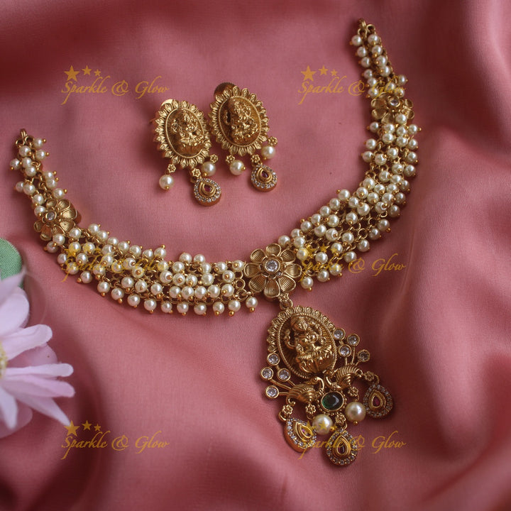Stunning Lakshmi carved pendant short necklace with cluster pearls and stones