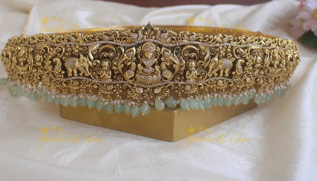 Grand intricate Lakshmi elephant peacock carved hipbelt with stones and green beads - Sparkle and Glow