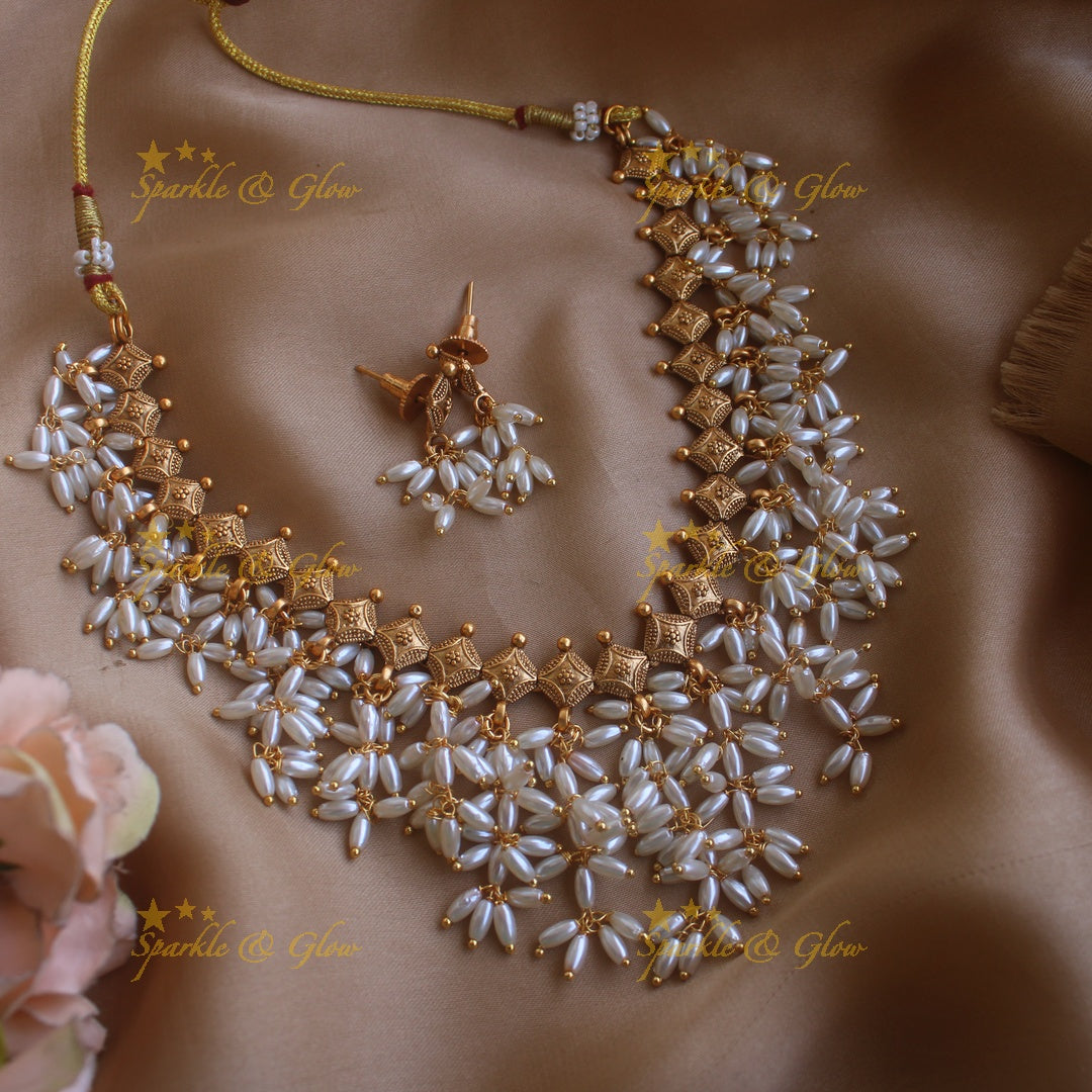 Stunning Gutta pusalu short necklace with rice pearls