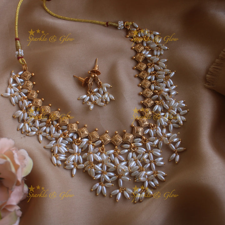 Stunning Gutta pusalu short necklace with rice pearls