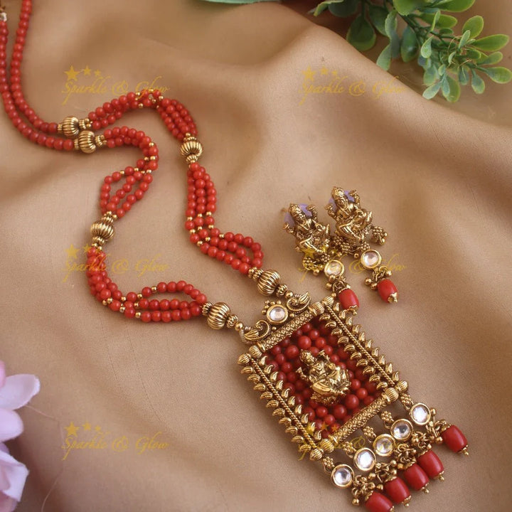 Stunning Lakshmi carved rectangle pendant haram with multi layer gold beads and pearl chain and stones - Sparkle and Glow