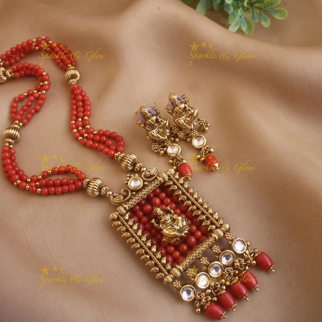 Stunning Lakshmi carved rectangle pendant haram with multi layer gold beads and pearl chain and stones - Sparkle and Glow