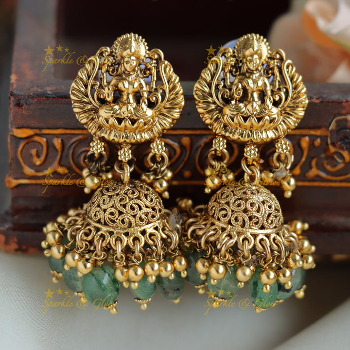 Elegant Lakshmi carved Cluster Gold short necklace with mint green beads