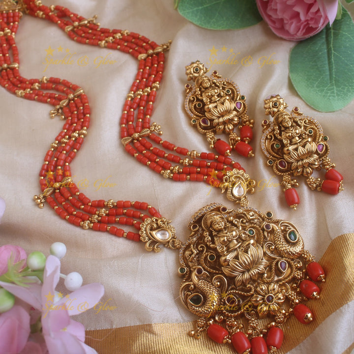 Beautiful Lakshmi peacock carved pendant haram with multi layer gold and coral beads chain and stones