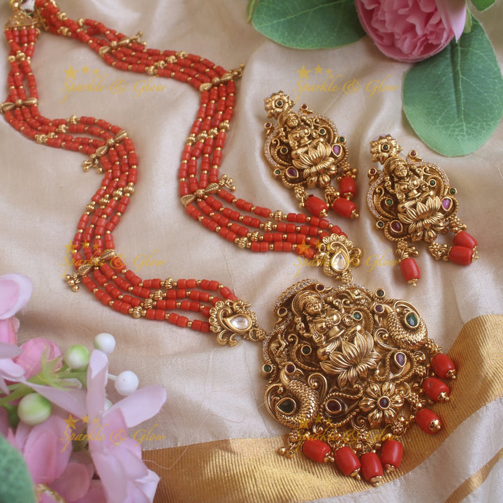 Beautiful Lakshmi peacock carved pendant haram with multi layer gold and coral beads chain and stones