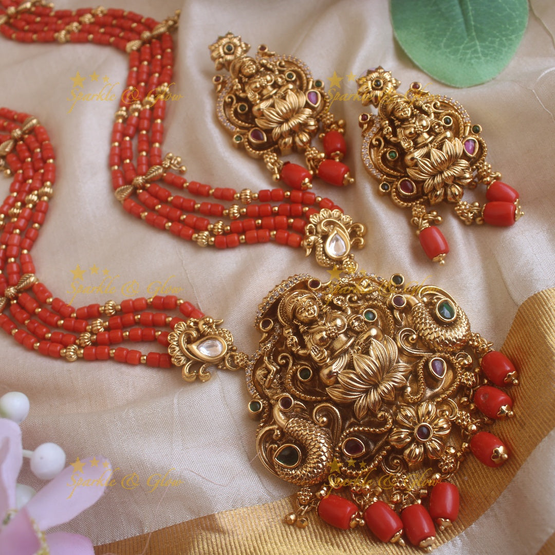 Beautiful Lakshmi peacock carved pendant haram with multi layer gold and coral beads chain and stones