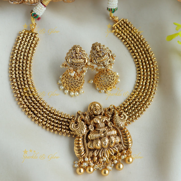 Statement Lakshmi peacock carved short necklace with gold beads
