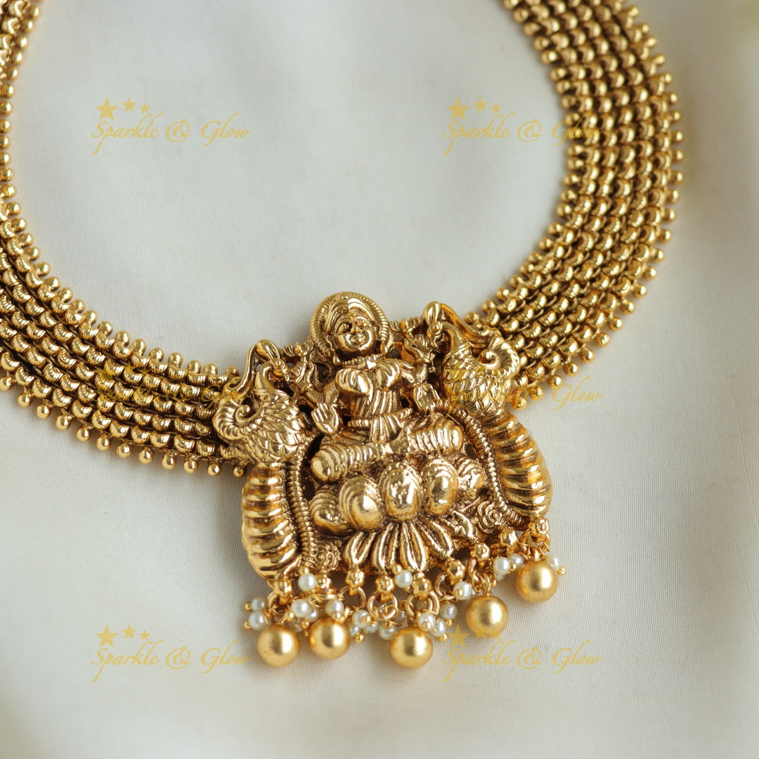 Statement Lakshmi peacock carved short necklace with gold beads