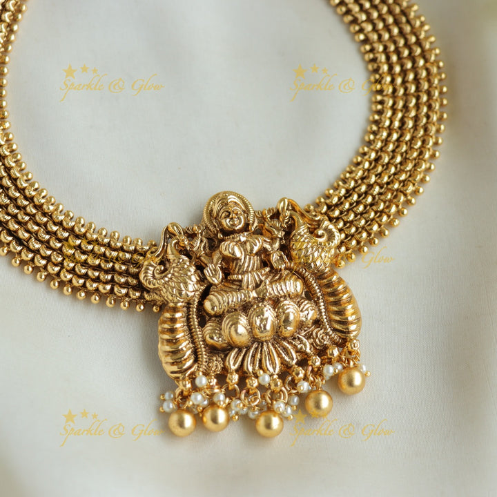 Statement Lakshmi peacock carved short necklace with gold beads