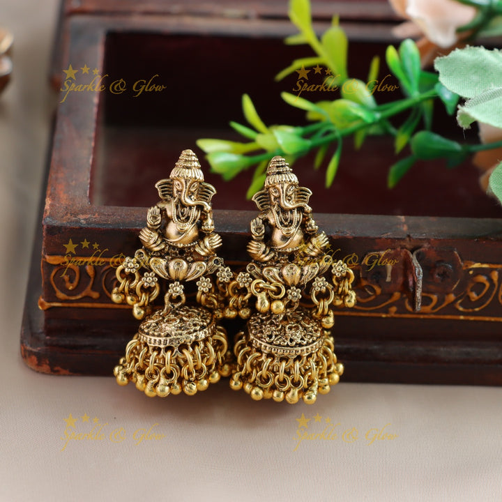 Beautiful Ganesha peacock carved high neck choker with multi layer gold beads