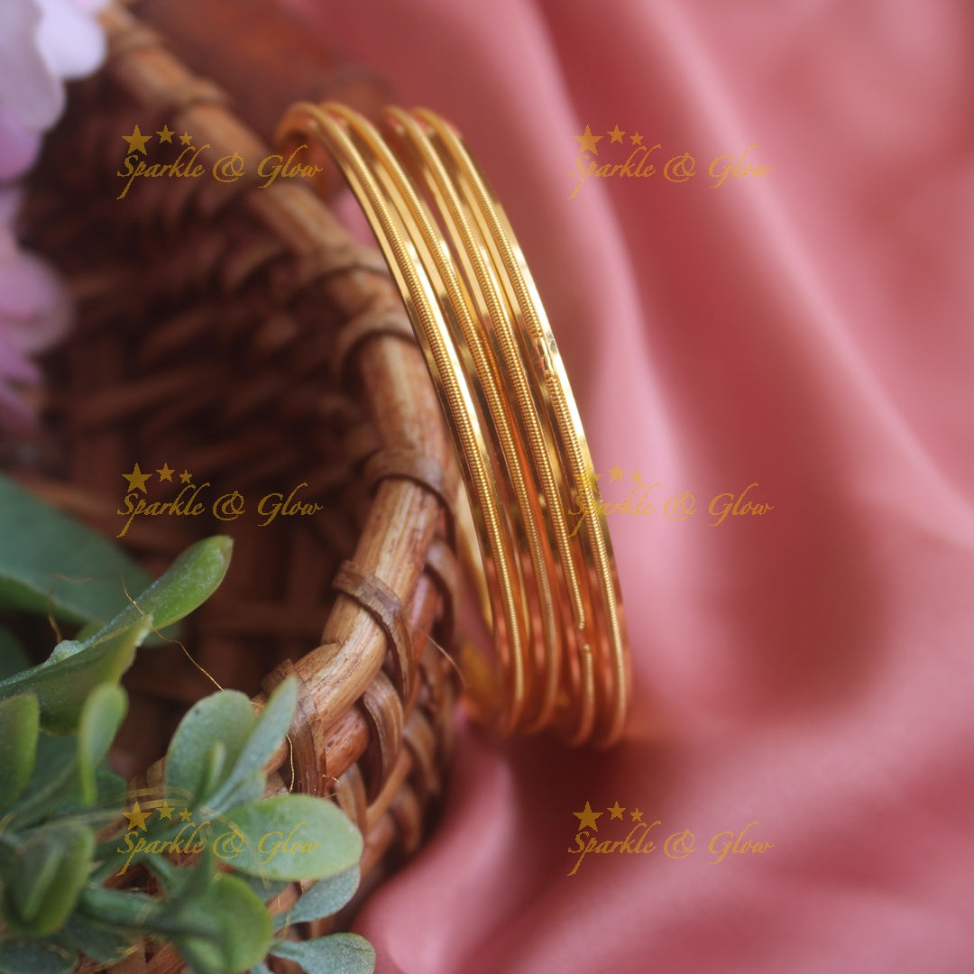 Beautiful Gold polished daily wear bangles two pairs,  2.4