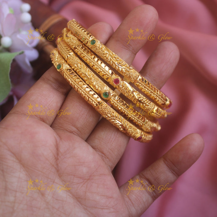 Stunning Leaf design Gold polished bangles with ruby and emerald two pairs,  2.4