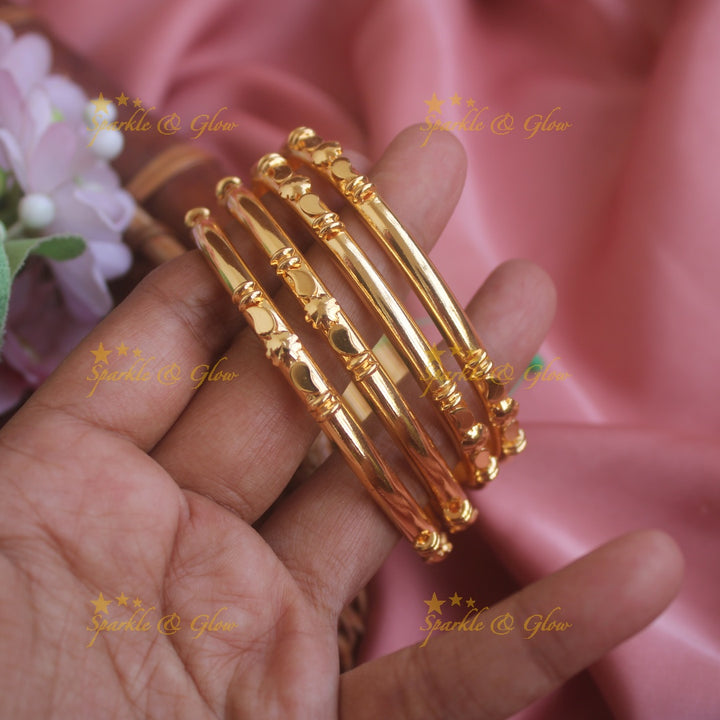 Gold polished Mango floral design daily wear bangles two pairs,