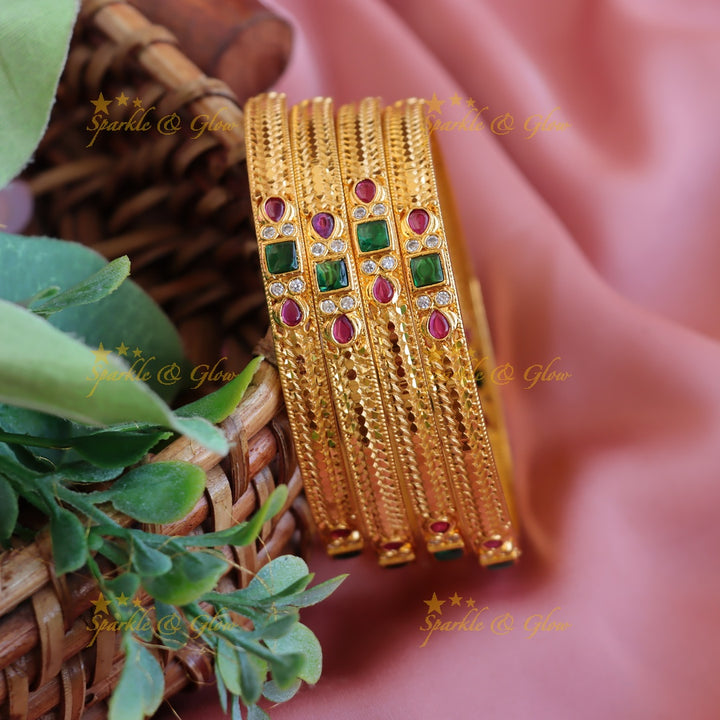 Statement Gold polished bangles with ruby and emerald two pairs,  2.4