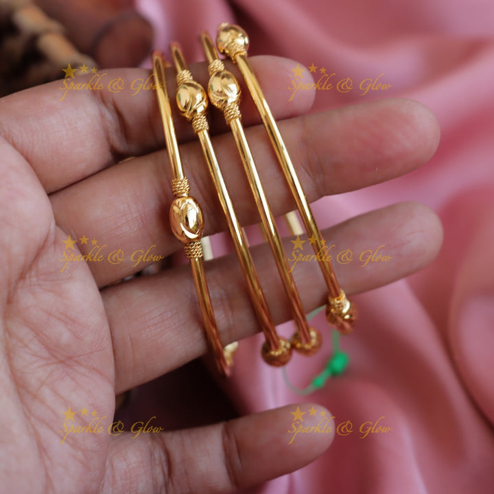 Elegant Gold polished daily wear bangles two pairs,  2.4