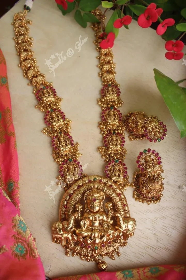 Gold alike Lakshmi haram crafted with kemp stones and carved with elephants - Gold - Sparkle and Glow