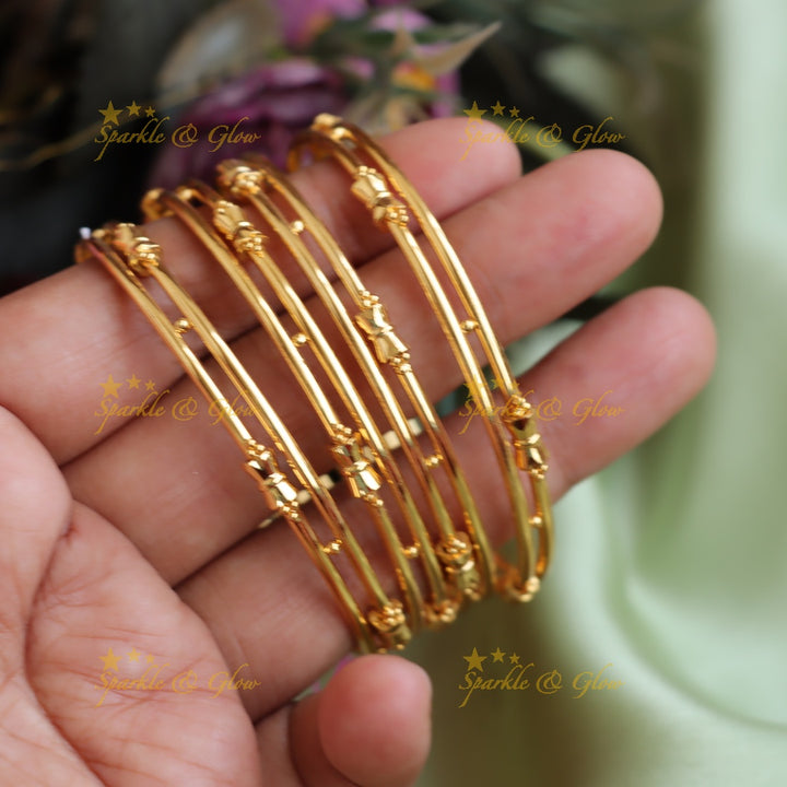 Gorgeous Gold polished Two line bangles two pairs, 2.4