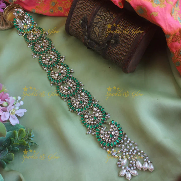 Beautiful Half Moon floral design antique finish long jadabilla with kundan stones and pearl drops - Sparkle and Glow