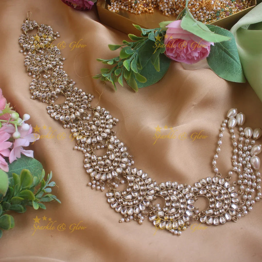 Beautiful Half Moon floral design antique finish long jadabilla with kundan stones and pearl drops - Sparkle and Glow
