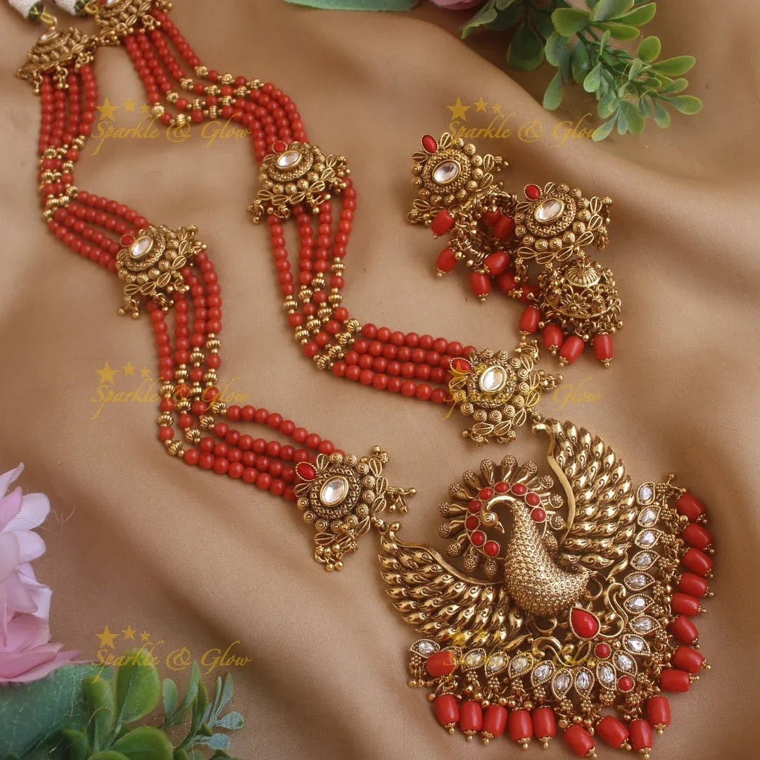 Stunning Peacock carved pendant haram with multi layer gold and coral beads chain and stones - Sparkle and Glow