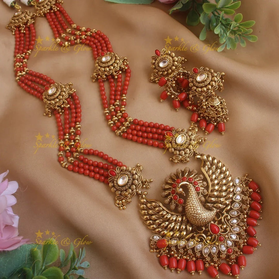 Stunning Peacock carved pendant haram with multi layer gold and coral beads chain and stones - Sparkle and Glow
