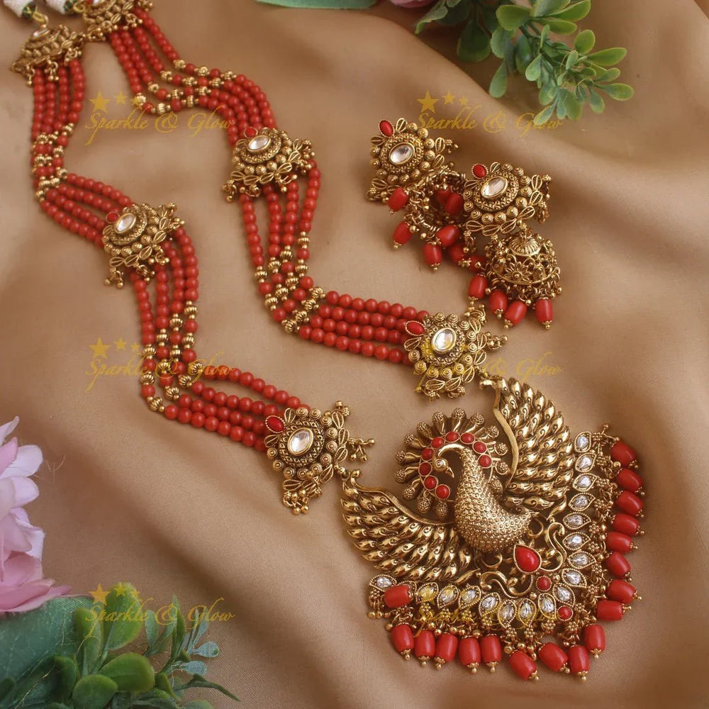 Stunning Peacock carved pendant haram with multi layer gold and coral beads chain and stones - Sparkle and Glow
