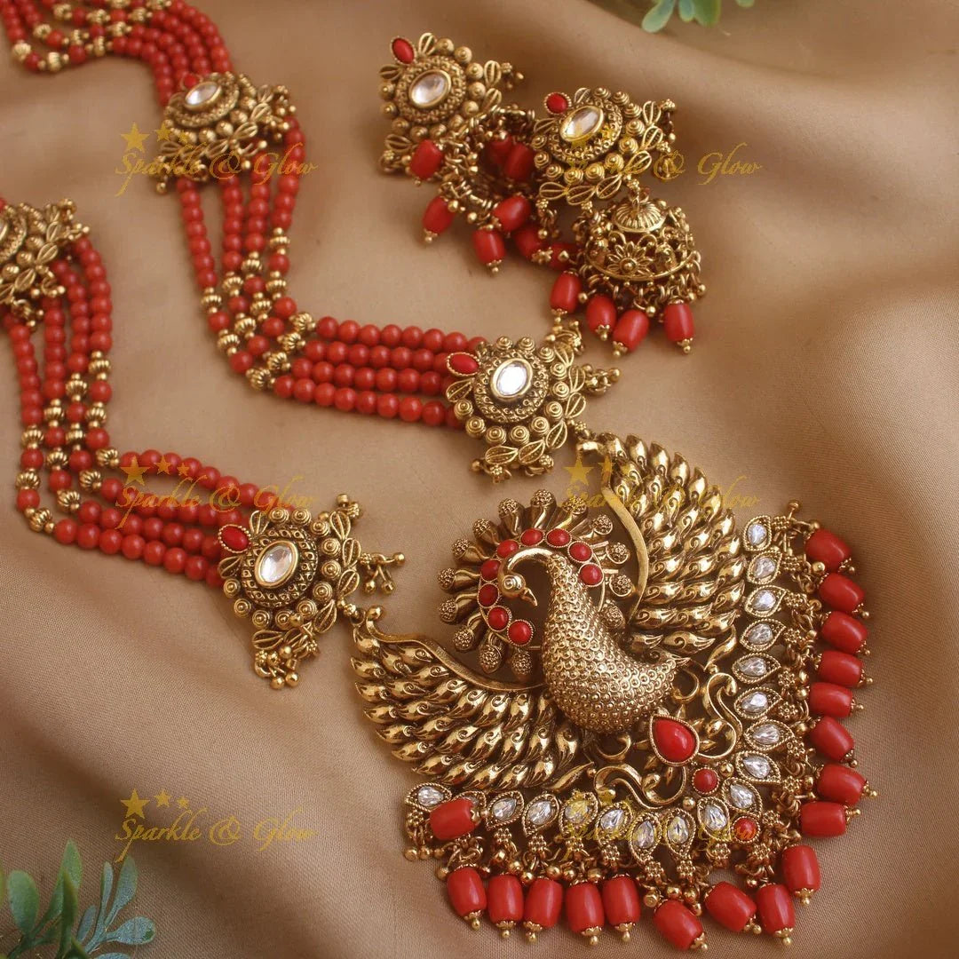 Stunning Peacock carved pendant haram with multi layer gold and coral beads chain and stones - Sparkle and Glow