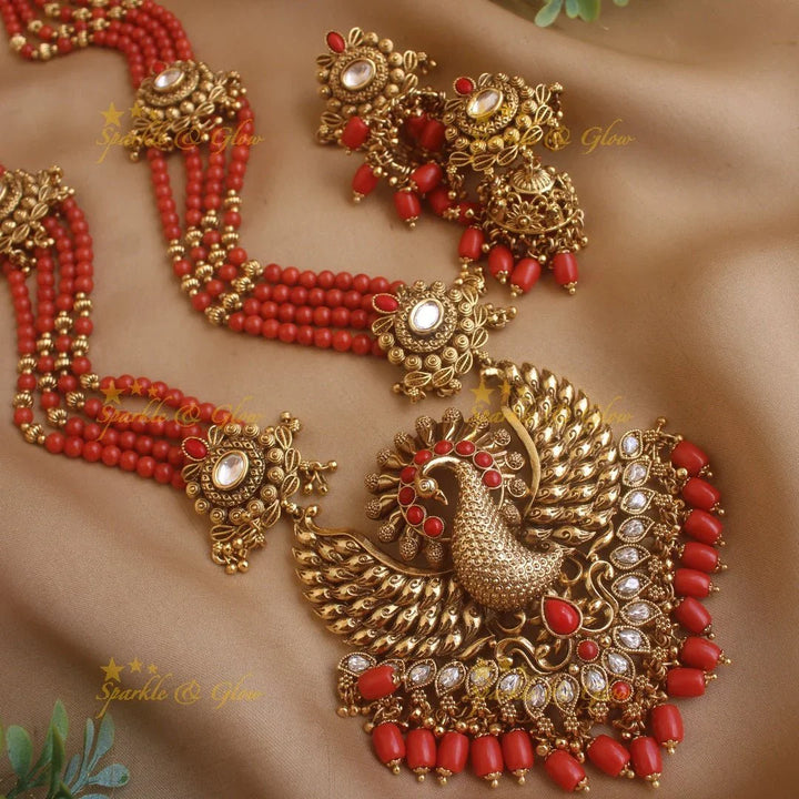 Stunning Peacock carved pendant haram with multi layer gold and coral beads chain and stones - Sparkle and Glow