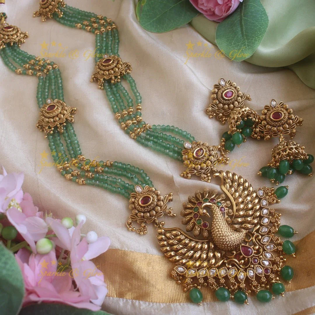 Stunning Peacock carved pendant haram with multi layer gold and mint green beads chain and stones - Sparkle and Glow