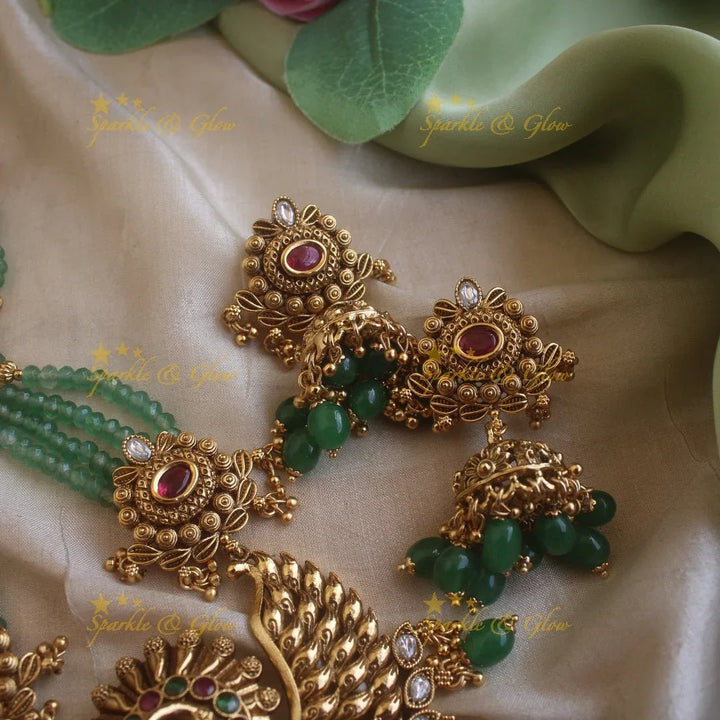 Stunning Peacock carved pendant haram with multi layer gold and mint green beads chain and stones - Sparkle and Glow