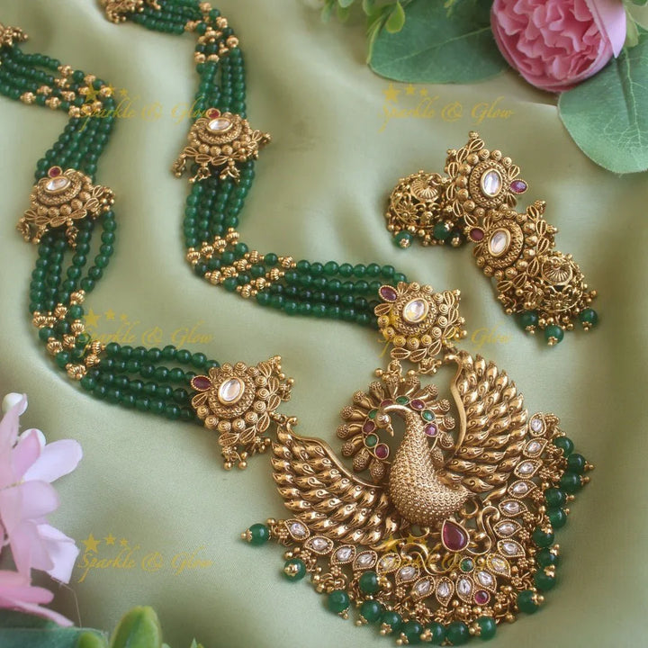 Stunning Peacock carved pendant haram with multi layer gold and green beads chain and stones - Sparkle and Glow