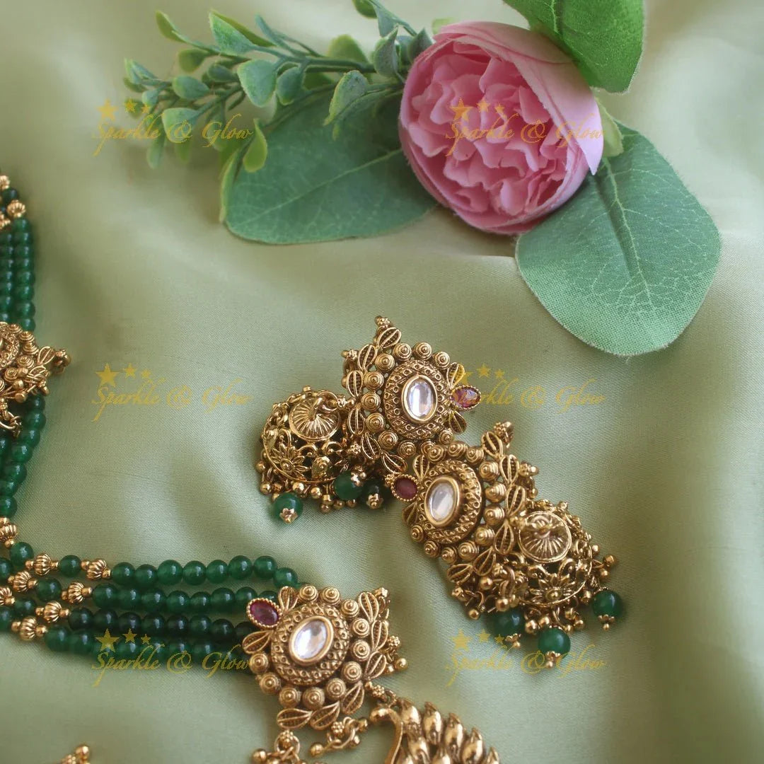 Stunning Peacock carved pendant haram with multi layer gold and green beads chain and stones - Sparkle and Glow
