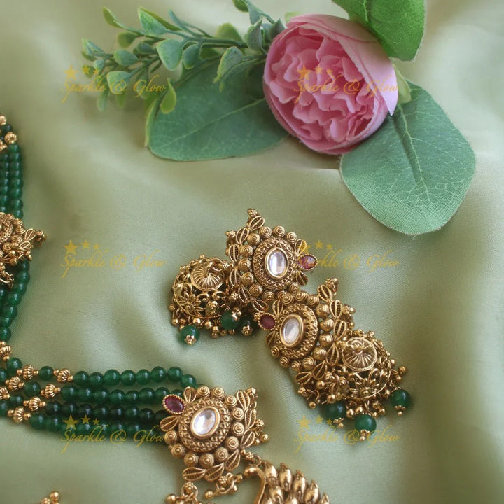 Stunning Peacock carved pendant haram with multi layer gold and green beads chain and stones - Sparkle and Glow
