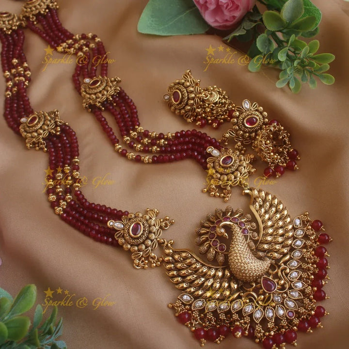 Stunning Peacock carved pendant haram with multi layer gold and maroon beads chain and stones - Sparkle and Glow
