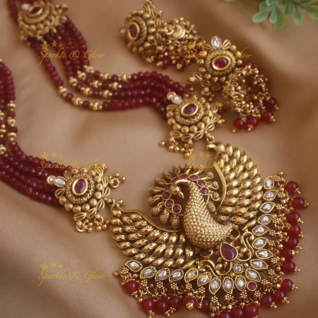 Stunning Peacock carved pendant haram with multi layer gold and maroon beads chain and stones - Sparkle and Glow