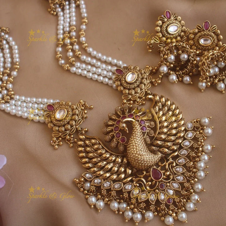 Stunning Peacock carved pendant haram with multi layer gold and pearl beads chain and stones - Sparkle and Glow