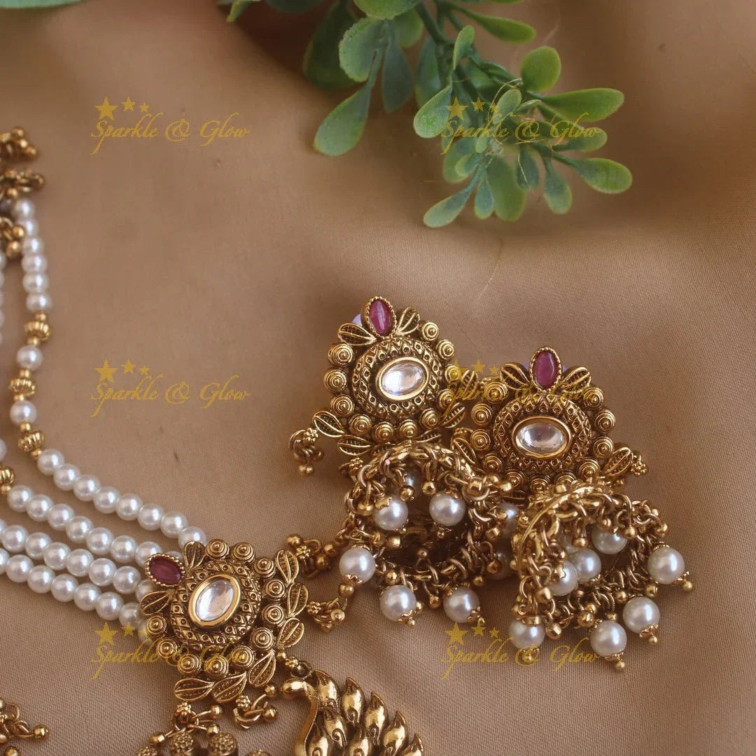 Stunning Peacock carved pendant haram with multi layer gold and pearl beads chain and stones - Sparkle and Glow