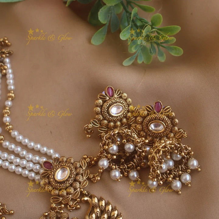 Stunning Peacock carved pendant haram with multi layer gold and pearl beads chain and stones - Sparkle and Glow