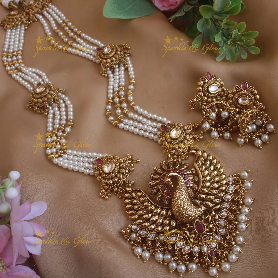 Stunning Peacock carved pendant haram with multi layer gold and pearl beads chain and stones - Sparkle and Glow