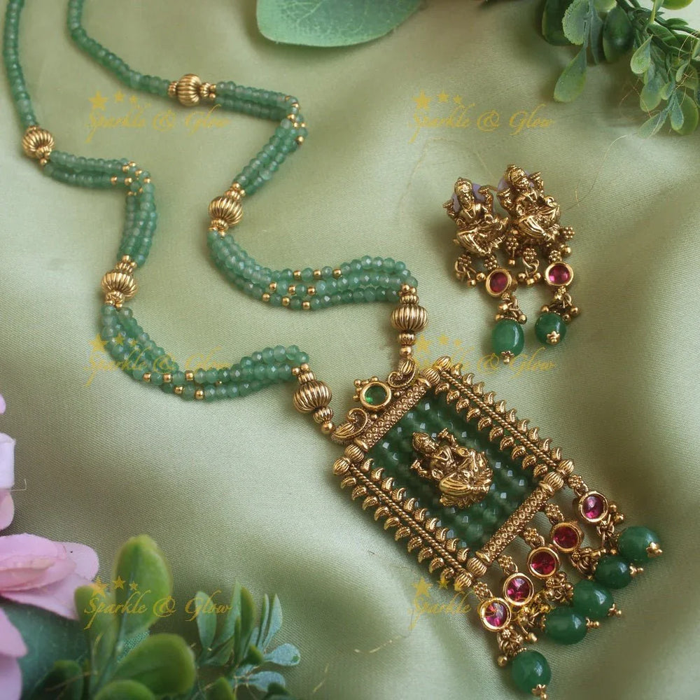 Stunning Lakshmi carved rectangle pendant haram with multi layer gold beads and pearl chain and stones - Sparkle and Glow