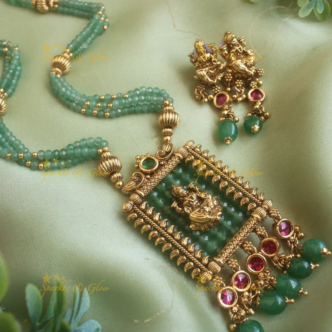 Stunning Lakshmi carved rectangle pendant haram with multi layer gold beads and pearl chain and stones - Sparkle and Glow