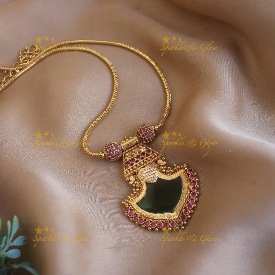 Beautiful Leaf design palakka pendant with chain with ruby stones - Sparkle and Glow