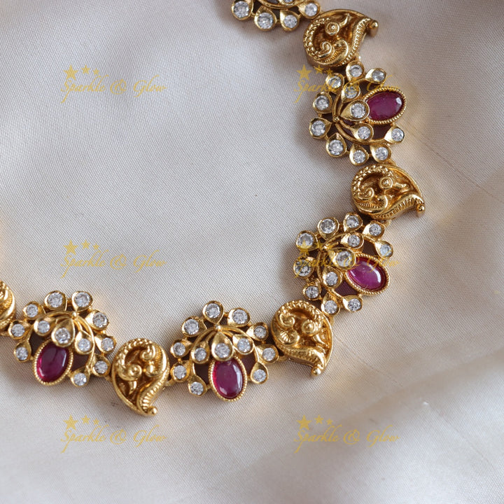 Elegant Floral and mango design AD short necklace with ruby stones