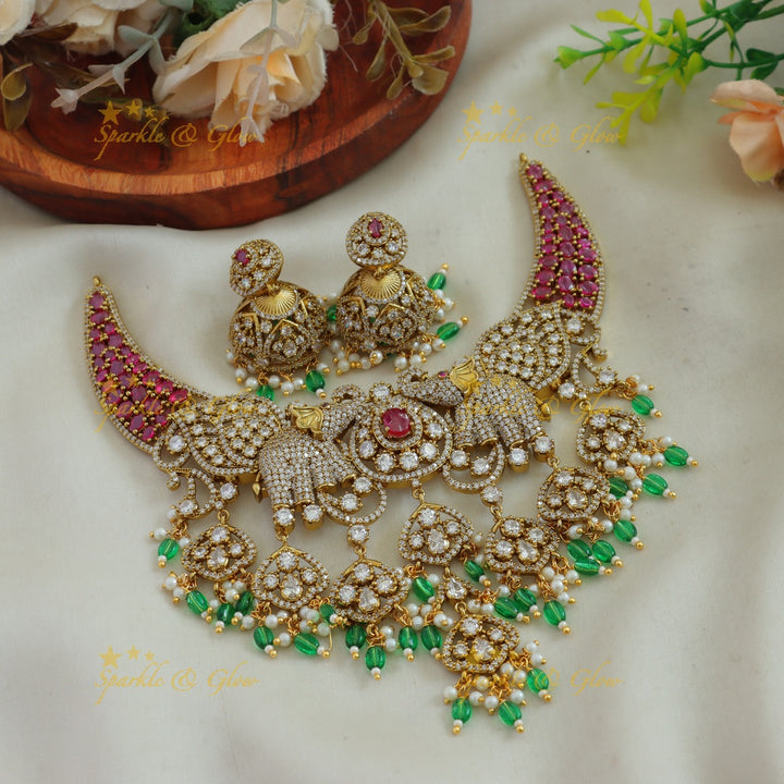 Beautiful Elephant and leaf design AD short necklace with ruby pearls and green beads